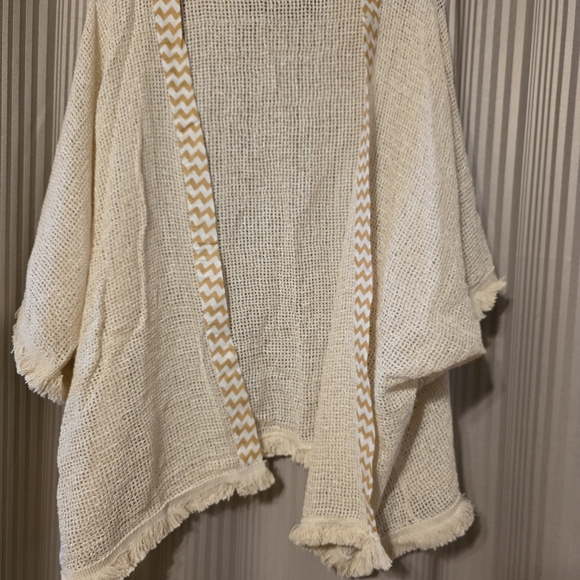 Kathmandu Sweaters - Kathmandu Cream Fringed Poncho. NWOT
